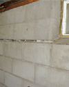 Severely buckling foundation walls in a home in Reinfeld in need of repairs.