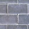 A diagonal stair-step crack found along a foundation wall in a Reinfeld home