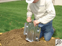 Steel earth anchor assembly installation in East St Paul.