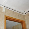 The ceiling and wall separating as the wall sinks with the slab floor in a Mitchell home