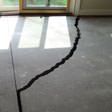 a huge crack in a concrete slab floor in Portage La Prairie