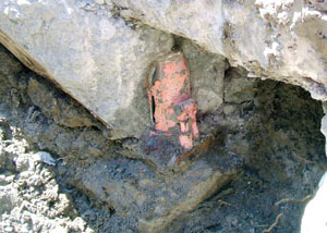 Failed concrete underpinning meant to repair a foundation issue in Mitchell.