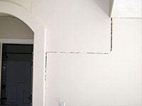 Drywall cracking due to foundation settlement in Reinfeld