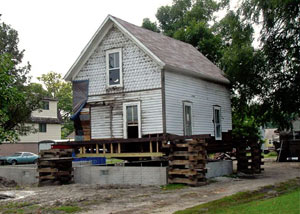 A severely damaged home foundation that is undergoing replacement in Altona.