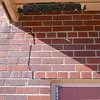 A long foundation crack that begins at a doorway of a Schanzenfeld home.