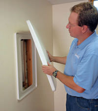 wall anchor covers installed in a foundation repair for a Oakbank home.