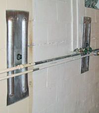 A foundation wall anchor system used to repair a basement wall in Schanzenfeld