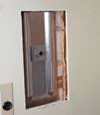 Wall anchor plates installed during a foundation repair in Brandon in a finished basement