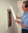 Winnipeg installation of wall anchor plate covers for a finished basement