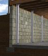I-beam foundation wall supports installed in a Grosse Isle basement.