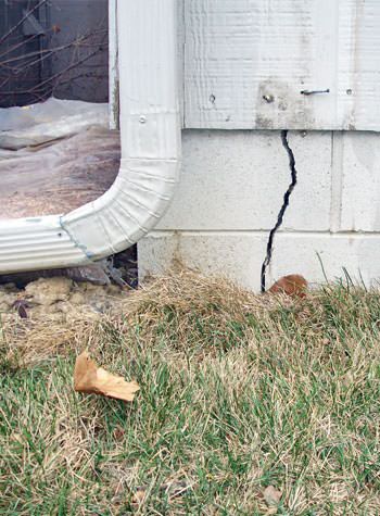 foundation wall cracks due to street creep in Gimli